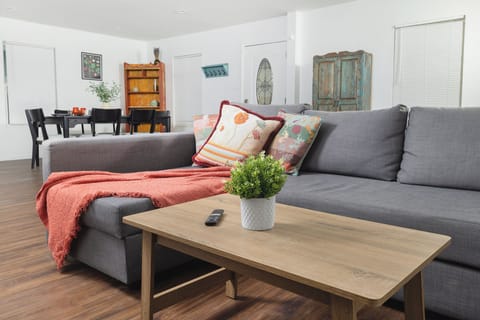 Cozy lounge with plush seating, warm decor, and space to unwind in comfort.