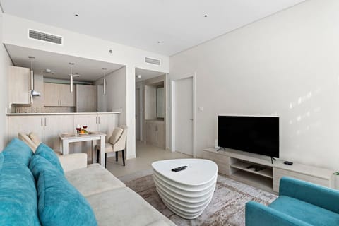 Living Room: Stylish retreat with modern decor, plush seating, and a view for relaxation.