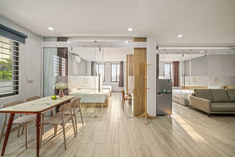 Family Penthouse, 2 Bedrooms, City View | Private kitchen | Fridge, dining table