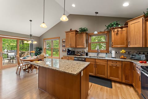 A bright, peaceful kitchen & dining space you'll enjoy coming home to. 
