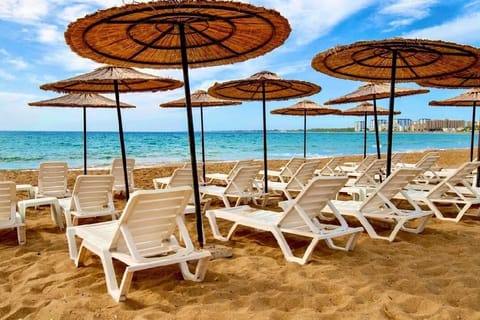 Beach nearby, sun loungers, beach umbrellas