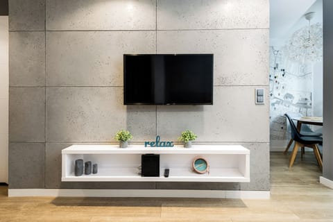 50-inch Smart TV with cable channels, Netflix, streaming services