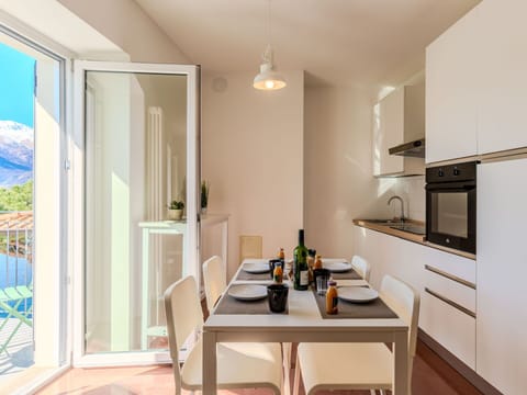 Flooring, Interior Design, Floor, Apartment, Balcony, Ceiling, Condominium, Chair, Shade, Porch