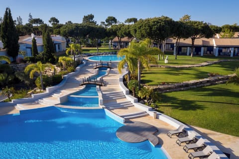 Indoor pool, outdoor pool, pool umbrellas, sun loungers