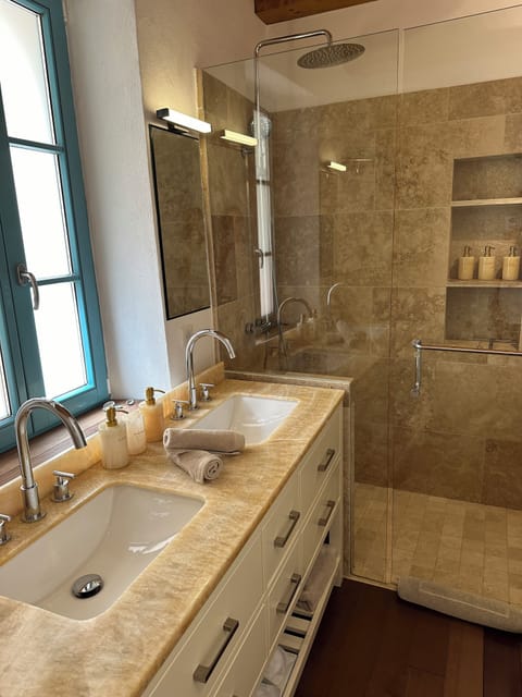 Shower, free toiletries, hair dryer, slippers