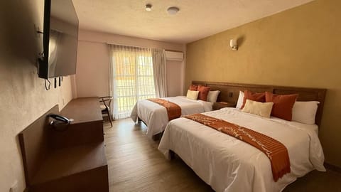 Desk, laptop workspace, blackout drapes, iron/ironing board