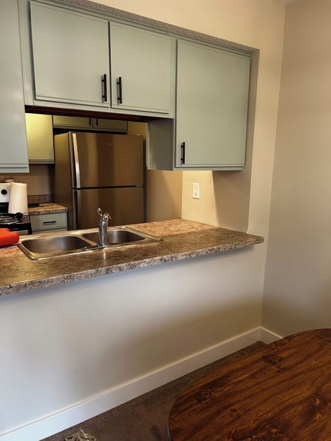 Galley type kitchen with Everything you need.