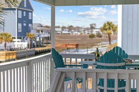 Pour yourself something cold, pull up a teal Adirondack chair, and watch the can
