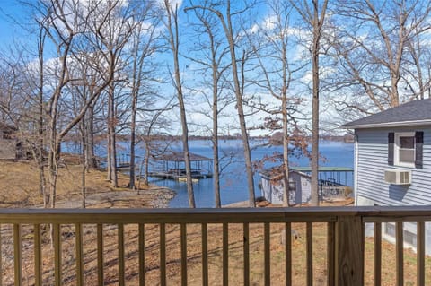View of lake and shared boat house/dock