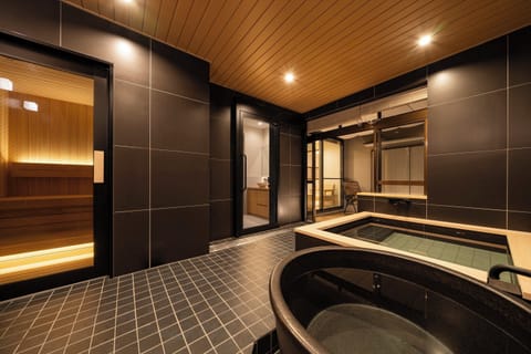 Deluxe House, 3 Bedrooms, Non Smoking, Sauna | Bathroom | Combined shower/tub, deep soaking tub, hair dryer, slippers