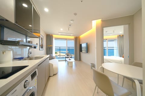 Premier Suite B | Living room | 55-inch Smart TV with cable channels, Netflix, pay movies