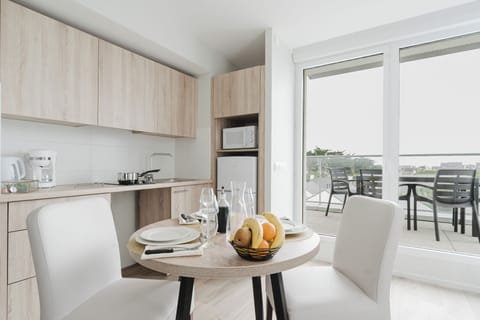 Mini-fridge, microwave, stovetop, coffee/tea maker