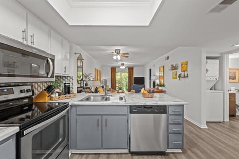 open-concept kitchen, dining, and living space 