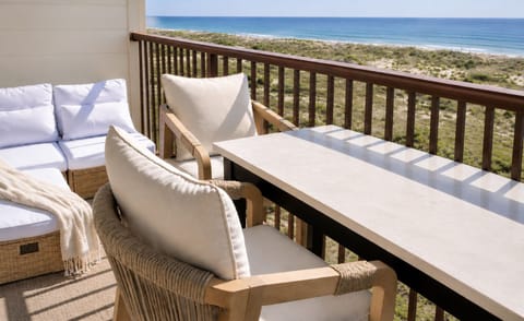Sip morning coffee overlooking the Atlantic from your private oceanfront balcony