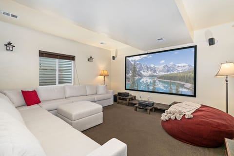 House, Multiple Beds, Patio, Garden View (7510 Poudre River Rd) | Living area | 65-inch flat-screen TV with digital channels, fireplace