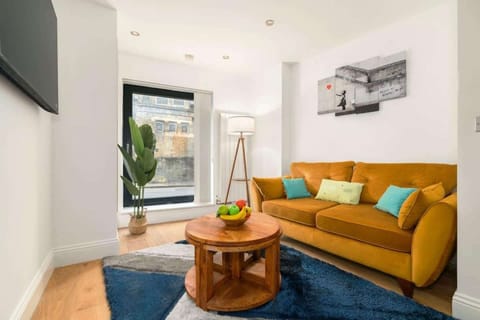 Bright open-plan kitchen and cosy living room with high-speed Wi-Fi and a Smart TV—the perfect space to cook, relax and feel at home