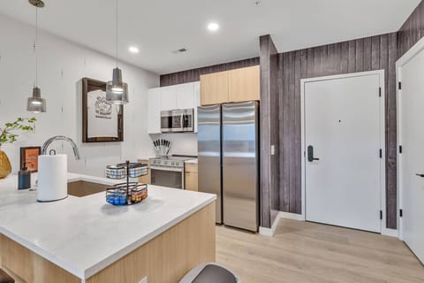 The Stage Fully equipped kitchen with complete with Keurig coffee maker and coffee bar!