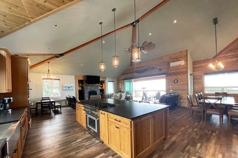 Open concept, vaulted ceiling and fabulous views from the kitchen.