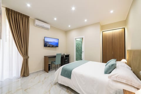 Standard Triple Room, Balcony, Courtyard View | Desk, laptop workspace, free WiFi