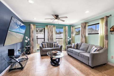Signature Townhome, 4 Bedrooms, Non Smoking, Pets Allowed | Living room | 65-inch Smart TV with digital channels