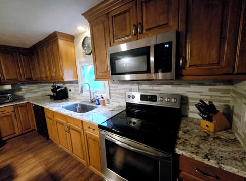 New Kitchen with state of the art Granite Counters and back splash. Keurig
