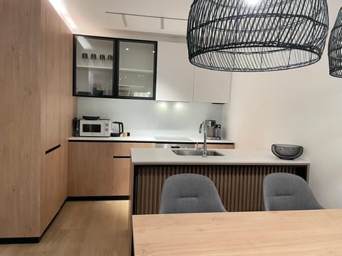 Luxury Apartment, Garden View | Private kitchen | Espresso maker, electric kettle