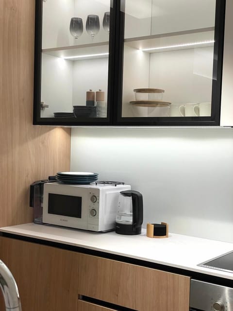 Luxury Apartment, Garden View | Private kitchen | Espresso maker, electric kettle