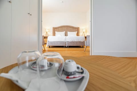 Deluxe Suite, Private Bathroom, Pool View | 1 bedroom, desk, laptop workspace, soundproofing