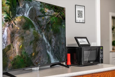 Unwind with your favorite shows on the TV, offering a relaxing retreat after a day of exploring.