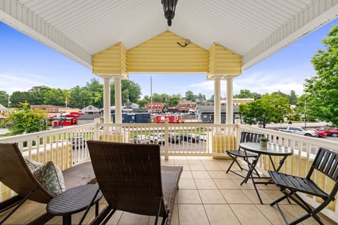 Unwind on your private veranda with stunning views of downtown Blue Ridge and the scenic train.