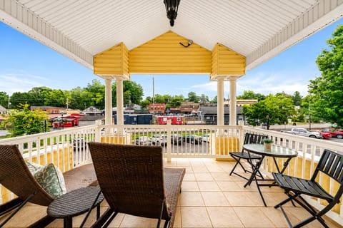 Unwind on your private veranda with stunning views of downtown Blue Ridge and the scenic train.