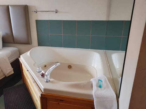 Superior Suite, 1 King Bed, Jetted Tub | Pillowtop beds, individually furnished, desk, iron/ironing board