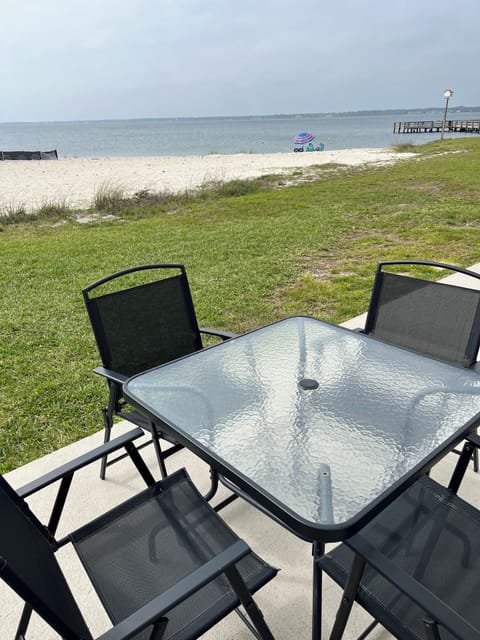 Your back patio first floor condo on water