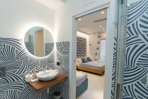 Superior Triple Room, Balcony | In-room safe, desk, free WiFi