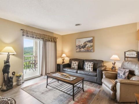 Spacious Living Room with Gas Fireplace, Sleeper Sofa and SMART TV with Cable & WIFI throughout vacation rental