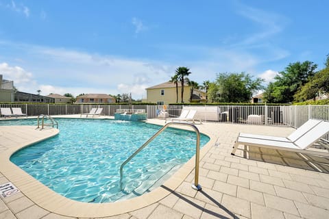 Take a refreshing dip in the sparkling community pool, just a minute walk from your door. Whether you're soaking up the sun, swimming laps, or lounging poolside, it's the perfect spot to unwind.