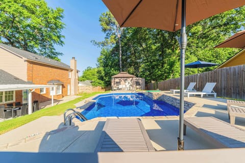 "Swim, lounge, and enjoy your peaceful backyard oasis."