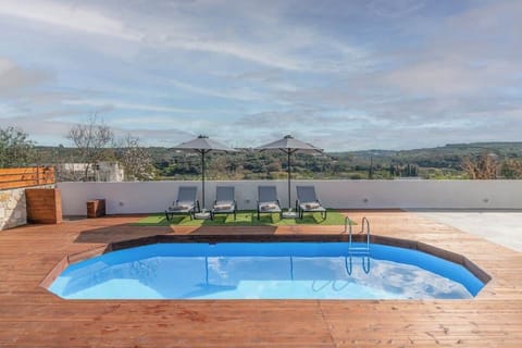 Elevated Pool Deck with Panoramic Views of the Cretan Countryside