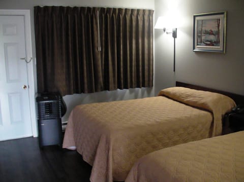 Standard Room, 2 Double Beds | Desk, iron/ironing board, rollaway beds, free WiFi