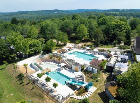 Seasonal outdoor pool, open 8:00 AM to 8:00 PM, pool umbrellas