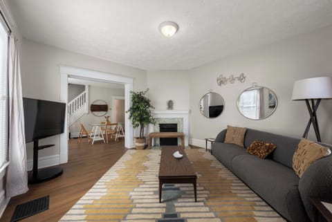 Curl up in the chic living room & stream your favorites on the smart TV