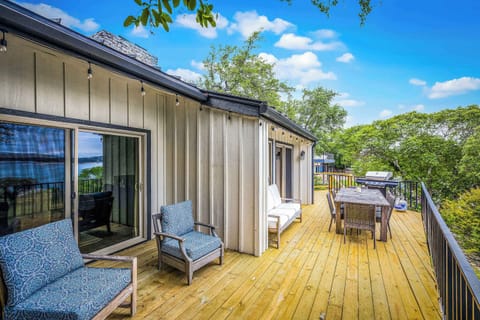 Spacious deck with comfy seating, dining area, and grill—perfect for outdoor gatherings!