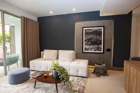 Beautiful and well ventilated living room with direct access to the big balcony. 