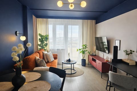 Superior Apartment, Balcony, City View | Living room | 50-inch Smart TV with cable channels, Netflix, streaming services