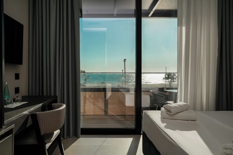 Deluxe Double Room, Balcony, Sea View | Hypo-allergenic bedding, minibar, free WiFi, bed sheets