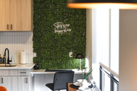 Modern dining setup with vibrant decor and cozy seating. ✨