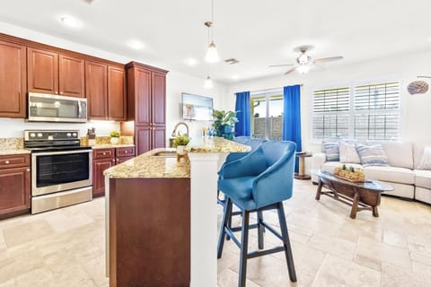 Kitchen adjacent to living room