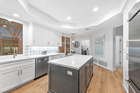 Gourmet kitchen with island seating.
