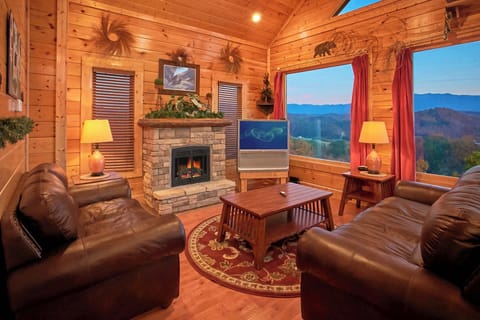 Welcome to Your Cozy Living Area, the Heart of the Cabin! Step into a warm and inviting living space where rustic charm meets modern comfort. 