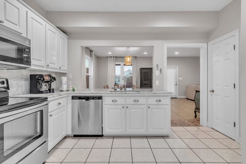 Beach Revival. Ft. Morgan, AL. Beach House. 3BR 2.5BA. Sleeps 12. Managed by Island Rentals.